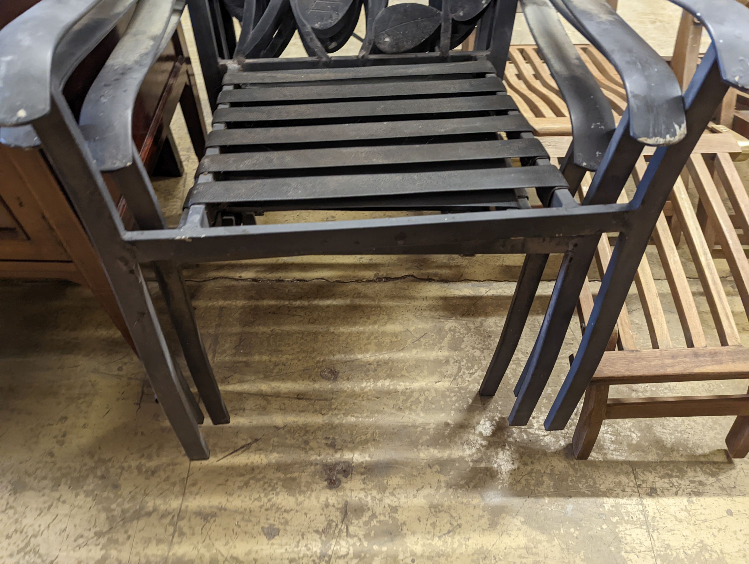 A set of four aluminium garden elbow chairs, width 62cm, depth 50cm, height 94cm